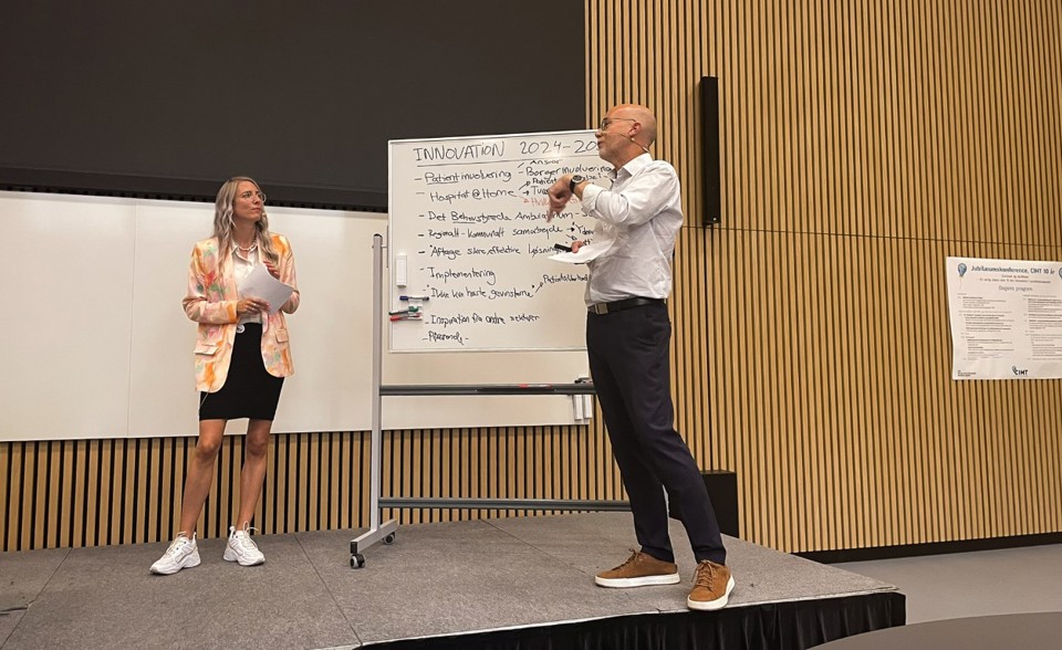 CIMT's programme manager and Head of Research on stage